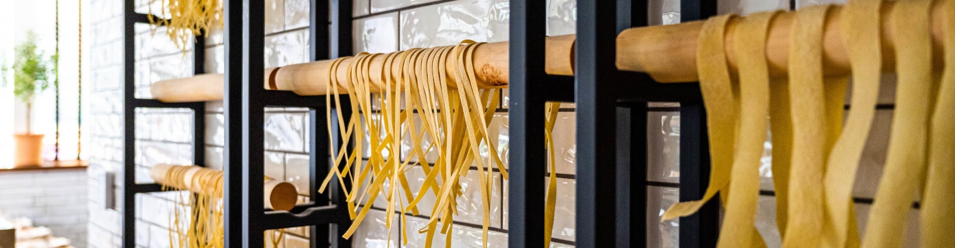 Pasta room - il Modo shot of pasta on the wall